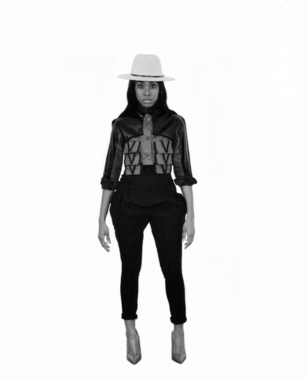 Addela McKenzie design — model wearing a structured monogram jacket